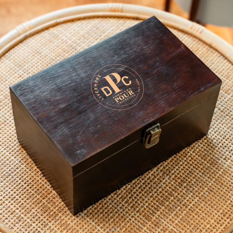Wooden keepsake box with the Downtown Pour Collective seal